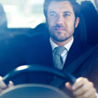 A man driving A man driving