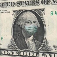 COVID-19 coronavirus in USA, ONE Dollar money bill with George Washington wearing healthcare surgical mask. Coronavirus in United States quarantine and global recession. Global economy hit by Covid19. COVID-19 coronavirus in USA, ONE Dollar money bill with George Washington wearing healthcare surgical mask. Coronavirus in United States quarantine and global recession. Global economy hit by Covid19.