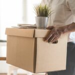 Downsize business. Employee moving off from office after sacked